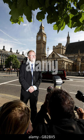 John Mason besucht den Houses of Parliament Stockfoto