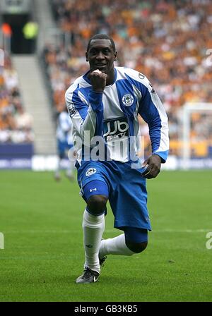 Fußball - Barclays Premier League - Hull City / Wigan Athletic - KC Stadium. Emile Heskey von Wigan Athletic feiert das vierte Tor des Spiels Stockfoto