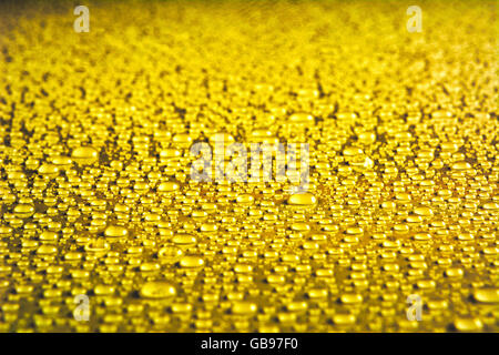 Goldenen Tropfen Textur. Wasser Tropfen Hintergrund Stockfoto