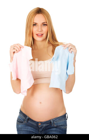 Schwangere Frau mit zwei kleinen Baby shirts Stockfoto