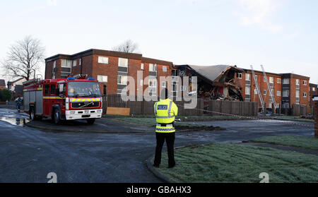 Die Überreste von drei Wohnungen in Worsley Mesnes, Wigan. Lancashire nach einer Gasexplosion gestern Abend. Stockfoto