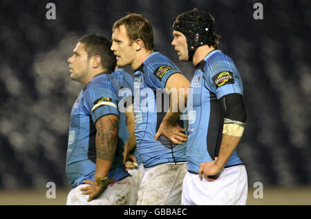 Rugby Union - Magners League - Edinburgh gegen Glasgow Warriors - Murrayfield. Glasgow's VA'a Justin, Alastair Kellock und John Barclay während des Spiels der Magners League in Murrayfield, Edinburgh. Stockfoto