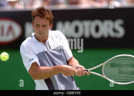 Jan-Michael Gambill aus den USA im Kampf gegen Sebastien Grosjean of Frankreich am dritten Tag der Australian Open Stockfoto