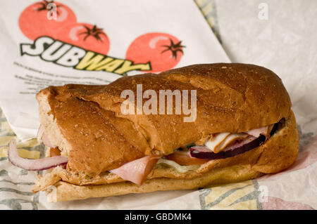 Kreditklemme steigert die Take-away-Fastfood-Ketten Stockfoto