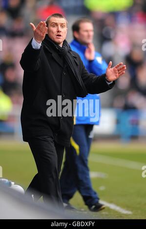 Fußball - Coca-Cola Football League One - Huddersfield Town / Leeds United - Galpharm Stadium. Huddersfield Town Manager Lee Clark (l) und Simon Grayson, Manager von Leeds United, stehen an der Reihe. Stockfoto