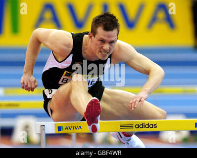 Leichtathletik - AVIVA Grand Prix - Nationale Hallenarena. Der britische Chris Baillie bei den 60-m-Hürden der Männer während des AVIVA Grand Prix in der National Indoor Arena, Birmingham. Stockfoto