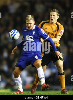 Fußball - Coca-Cola Championship - Birmingham City / Wolverhampton Wanderers - St Andrew's Stadium. Garry O'Connor (links) von Birmingham City hält Christophe Berra von Wolverhampton Wanderers (rechts) im Kampf um den Ball zurück Stockfoto