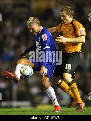 Fußball - Coca-Cola Championship - Birmingham City / Wolverhampton Wanderers - St Andrew's Stadium. Garry O'Connor (links) von Birmingham City hält Christophe Berra von Wolverhampton Wanderers (rechts) im Kampf um den Ball zurück Stockfoto