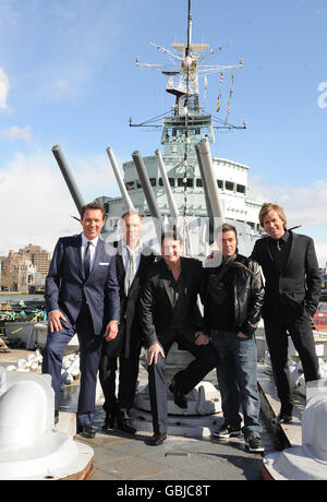 Die 80er Jahre Popgruppe Spandau Ballet kündigt ihr Comeback bei einer Fotoschau auf der HMS Belfast in London an. Stockfoto