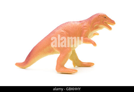 Seite Ansicht orange Kunststoff Dinosaurier Spielzeug auf weißem Hintergrund Stockfoto