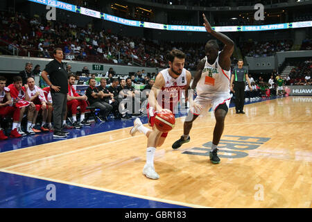 Philippinen. 7. Juli 2016. Türkei und Senegal kämpften um die FIBA Olympischen Qualifikationsturnier für das Halbfinale in der Mall von Asien Arena in Pasay City. Türkei gewonnen über Senegal, 68-62. © J Gerard Seguia/ZUMA Draht/Alamy Live-Nachrichten Stockfoto