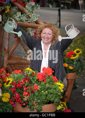 Winnie-the-Pooh-Gartenarbeit-initiative Stockfoto