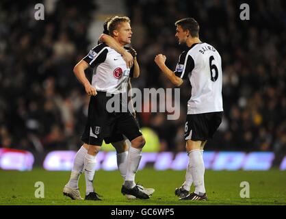 Fußball - Barclays Premier League - Fulham gegen Bolton Wanderers - Craven Cottage. Fulhams Damien Duff feiert das erste Tor seiner Seite Stockfoto