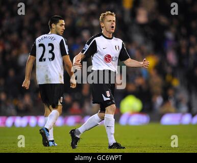 Fußball - Barclays Premier League - Fulham gegen Bolton Wanderers - Craven Cottage. Fulhams Damien Duff feiert das erste Tor seiner Seite Stockfoto