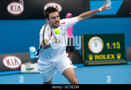 Der Großbritanniens Colin Fleming im Doppelspiel mit Ken Skupski gegen den Finnen Jarkko Nieminen und den Deutschen Michael Kohlmann am sechsten Tag der Australian Open 2010 im Melbourne Park, Melbourne, Australien. Stockfoto