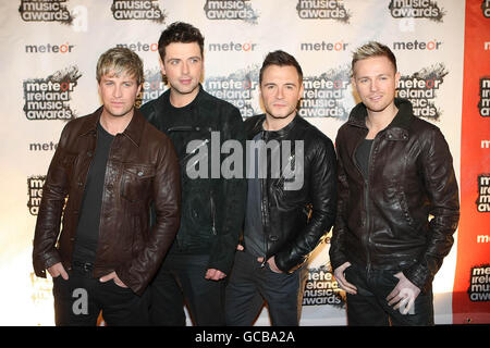 Von links: Kian Egan von Westlife, Mark Feehily, Shane Filan und Nicky Byrne kommen bei den Meteor Ireland Music Awards an der RDS, Dublin. Stockfoto