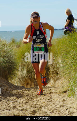 Wettbewerber in Anglesey Sandman Triathlon Stockfoto