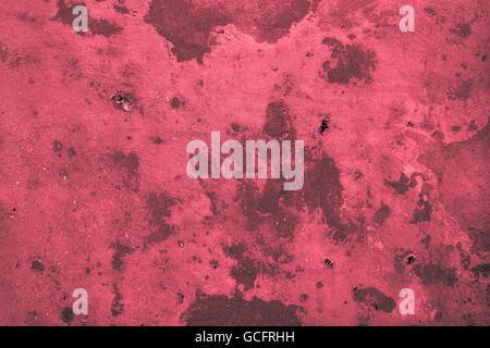 Ausgezeichnete rote rötliche graue Stein Wand Hintergründe: trashig mit Bohrungen Stockfoto