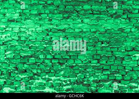 Unterirdische Mauer alt mit Steinen und Farben in Mintgrün grau leicht grünlich Stockfoto