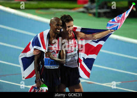 Die Briten Mo Farah (links) und Chris Thompson zelebrieren ihre Ein-zwei-Ziel in den Herren 10000m Stockfoto