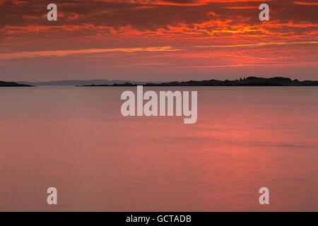 Dramatischen Sonnenuntergang über die Inseln der Flotte, Galloway, Schottland Stockfoto