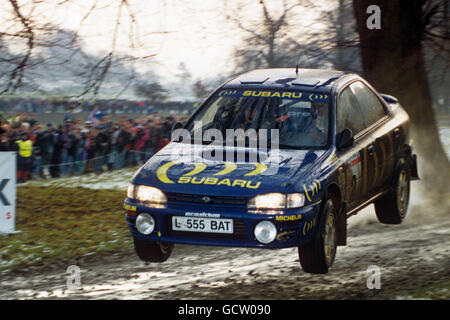 Colin McRae und sein Beifahrer Derek Ringer in seiner Subaru Impreza 555 während der RAC Rally, die sie dann gewinnen konnten Stockfoto