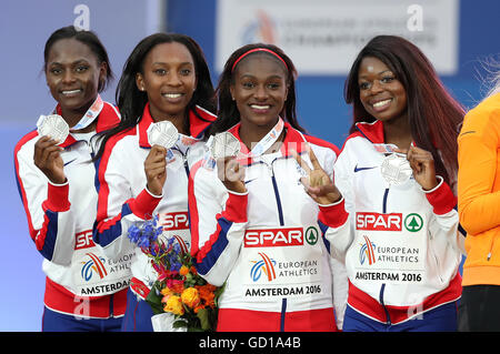 (L-R) Großbritanniens Daryll Neita, Bianca William, Dina Asher-Smith und Asha Philip nach dem zweiten Platz in der Frauen 4x100m Staffel Finale in Aktion während die Männer Hochsprung letzte Tag fünf der European Athletic Championships 2016 im Olympiastadion Amsterdam. Stockfoto