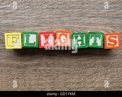 Flüge Wort getan mit Holz-Block schreiben Spielzeug Stockfoto