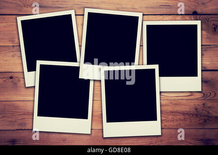 Alte leere Rahmen Foto auf Holz Hintergrund und Struktur Stockfoto