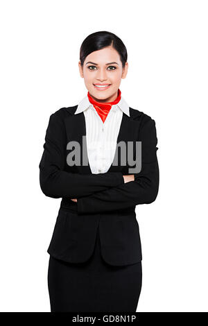 1 indische erwachsenen Frau Air Hostess Arme gekreuzt stehenden Posing Stockfoto