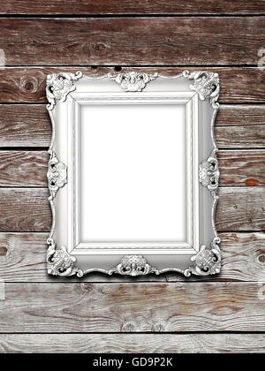 Nahaufnahme einer leere Quadrat Silber Barock Bilderrahmen auf Braun verwitterte Holzbretter Hintergrund Stockfoto