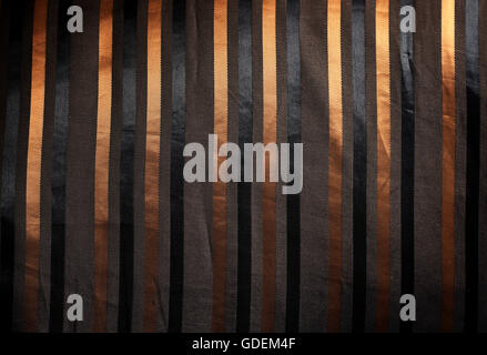 glänzende Luxus Seide Stoff mit goldenen Streifen Stockfoto