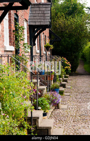 Ferienhäuser in Styal Village Steinbruch-Bank-Mühle Stockfoto