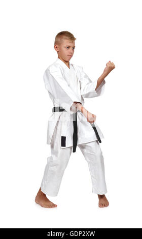 Karate-junge im weißen Kimono mit schwarzem Gürtel Stockfoto