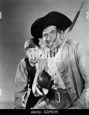 TREASURE ISLAND 1950 Walt Disney Film mit Robert Newton auf der rechten Seite und Long John Silver und Bobby Driscoll als Jim Hawkins Stockfoto