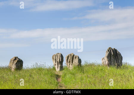 Duddo Stone Circle, einem alten Steinkreis historisches Denkmal in der Sonne in einen Acker in Northumberland Stockfoto