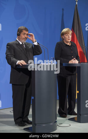 Mursi und Merkel Stockfoto