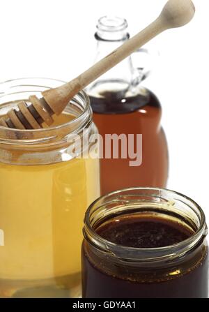 Honig, Melasse und Mapple Sirup Stockfoto