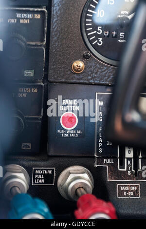 Close-up of red panic button in cockpit, Venezuela Stockfoto