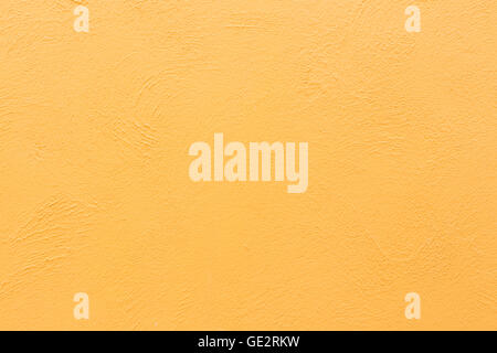 abstrakte gold gelbe Hintergrundfarbe, leichte Ecke Scheinwerfer, schwach orange Vintage Grunge Hintergrund Textur gold gelbes Papier Stockfoto