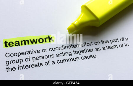 Definition der Teamarbeit, in Farbe hervorgehoben. Stockfoto