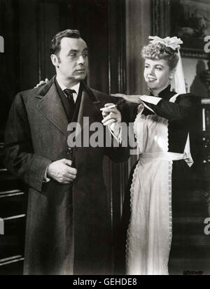 Charles Boyer, Angela Lansbury Das Hausmaedchen Nancy (Angela Lansbury) Bestaetigt Die Aussagen des Hausherren Gregory Anton (Charles Boyer). Lokalen Caption *** 1944, Gaslight, Das Haus Der Lady Alquist Stockfoto