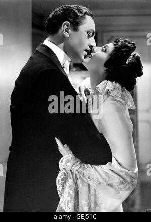 William Powell, Luise Rainer Florenz Ziegfeld (William Powell) Hut seit Konkurrenten sterben Saengerin Anna Held (Luise Rainer) Weggeschnappt. Sie Folgt Ihm Nach New York Und Heiratet Ihn, Obwohl er Voellig Abgebrannt ist. Lokalen Caption *** 1936, große Stockfoto