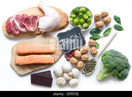 Lebensmittel reich an Eisen, einschließlich Fleisch, Fisch, Hülsenfrüchte und Samen Stockfoto