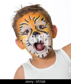 schöne junge Kind mit Kinderschminken ein Tiger oder ein Löwe Stockfoto