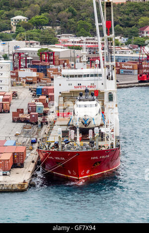 Rot-Frachter am St. Thomas-Dock mit Containern Stockfoto