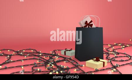 Geschenktüte umgeben von Geschenk-Boxen und Weihnachtsbeleuchtung in rosa Stockfoto