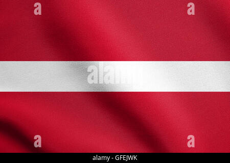 Flagge von Lettland winken in den Wind mit detaillierten Stoff. Lettischen Nationalflagge. Stockfoto