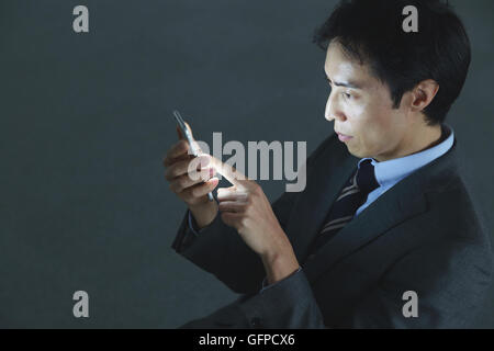 Japanischer Geschäftsmann in leeres Büro Stockfoto