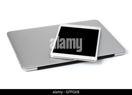 Notebook und Tablet auf weißen Hintergrund isoliert Stockfoto
